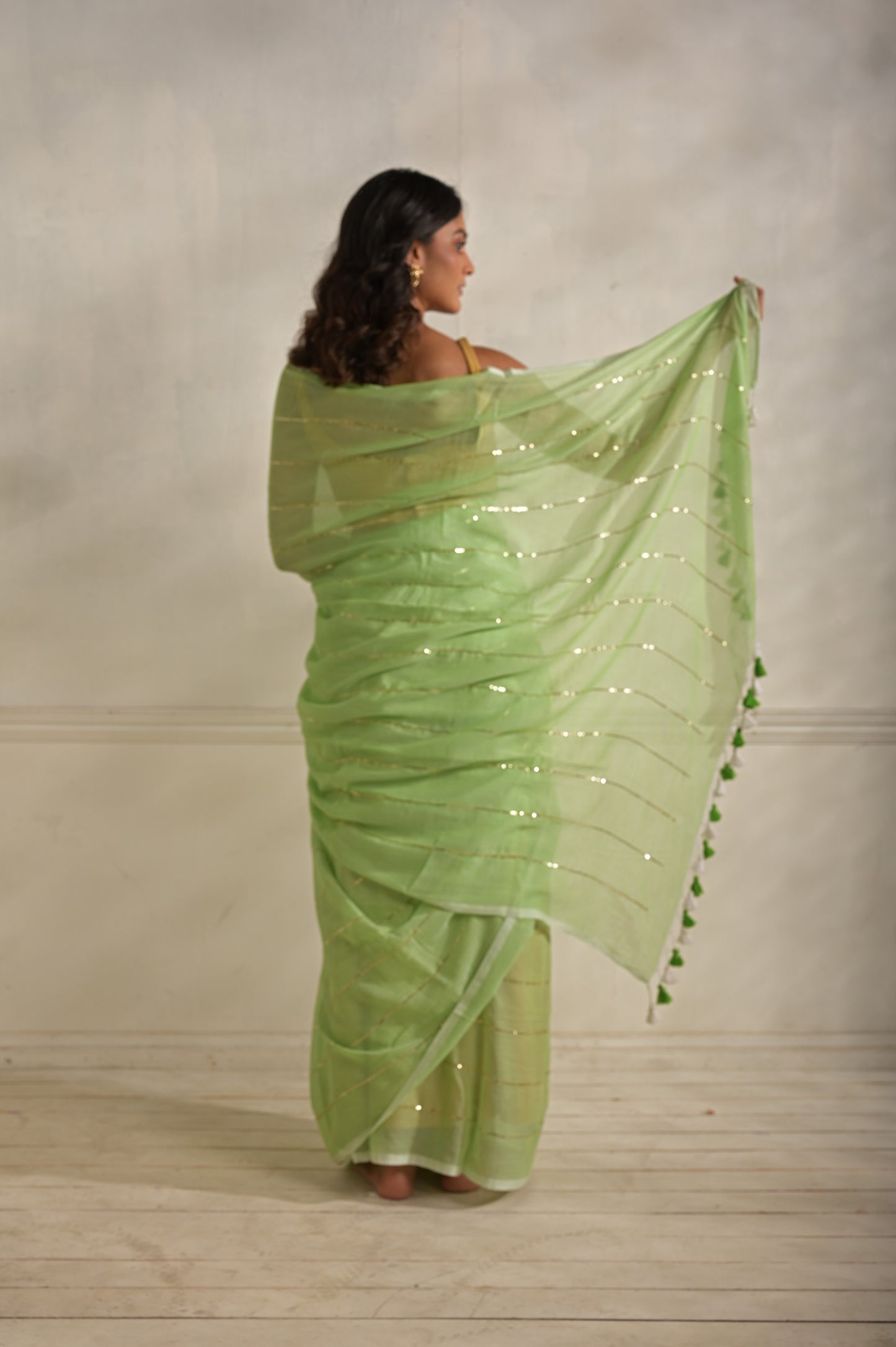 Miraya | Mint Green Handloom Mul Cotton saree with sequined lines