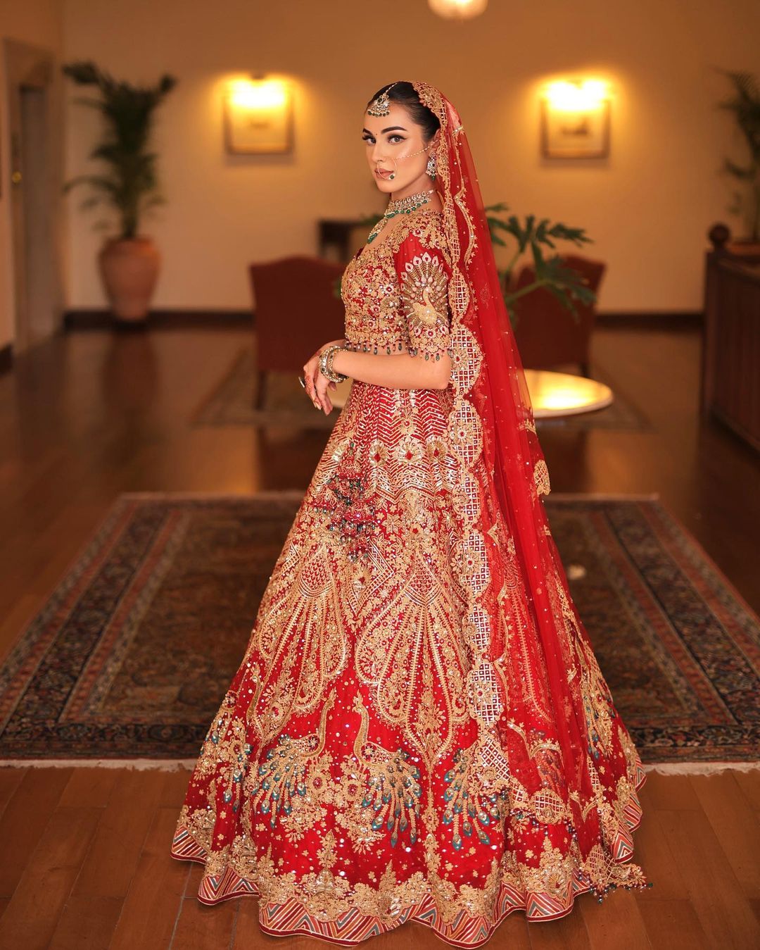 Passionate Red Sequins Embroidered Bridal Lehenga Set With Zari &Cut Dana in Raw Silk