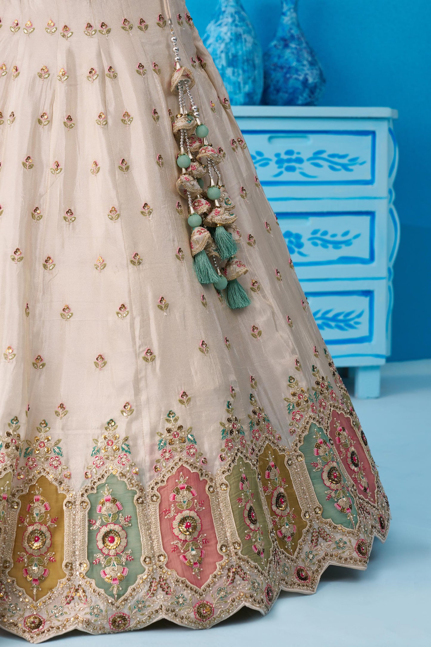 Cream & Sea Green Tissue Sequins Embroidered Lehenga Choli