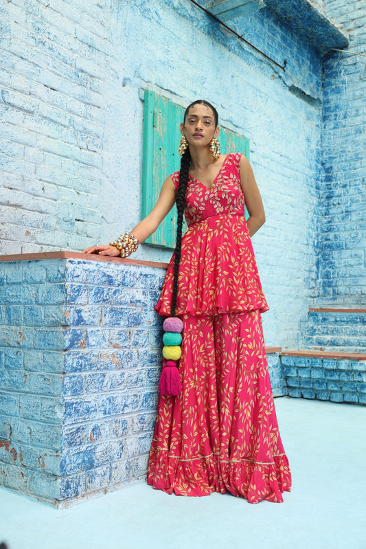 Rasberry pink digital printed flared Crepe gharara and hand embroidered tunic paired up with braided belt