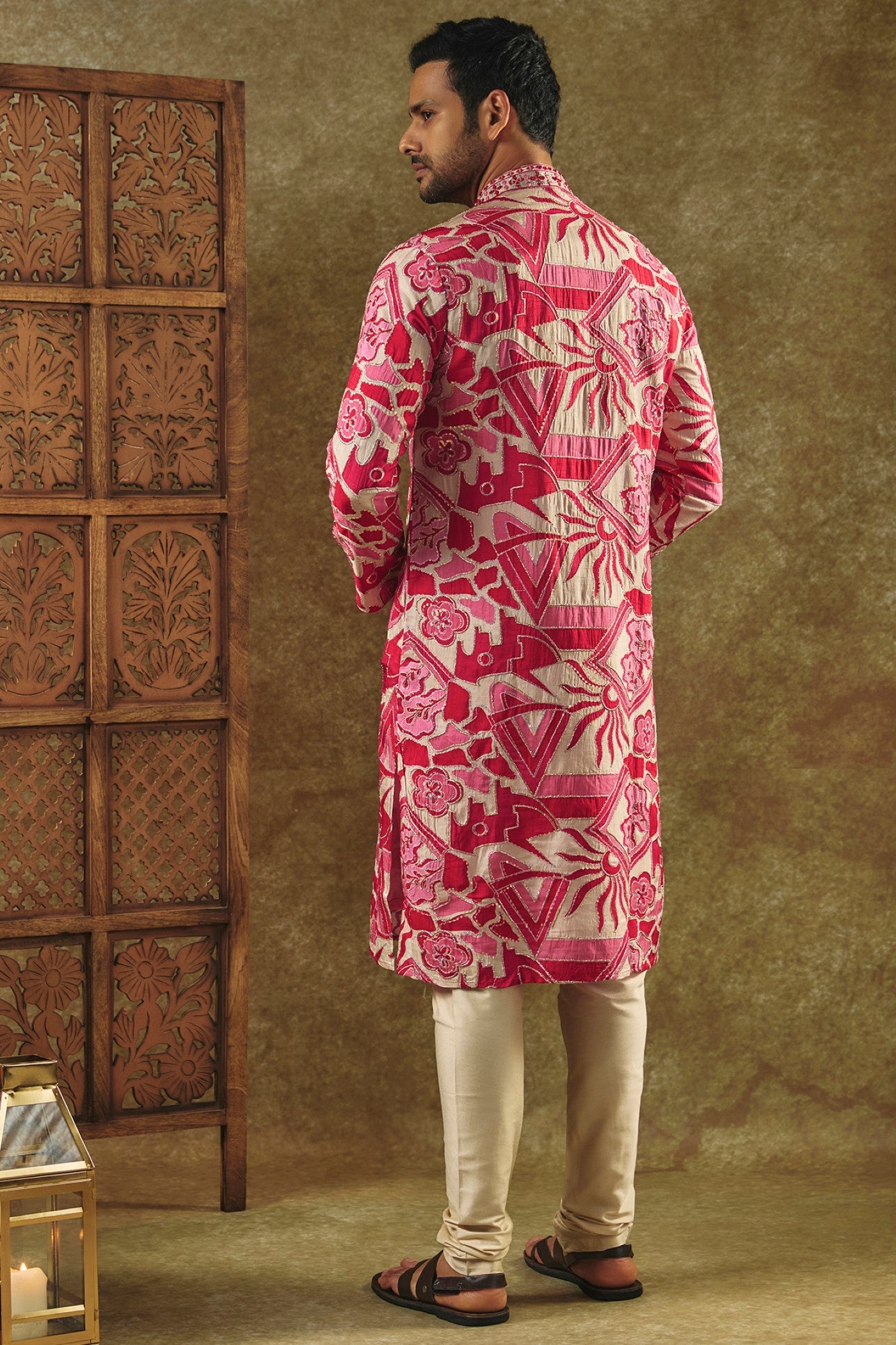 Rani Pink Printed Silk kurta pajama set with resham embroidered neck