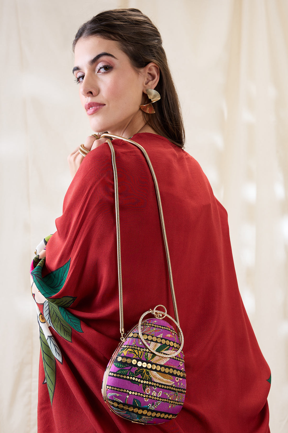 Aarani embellished clutch bag