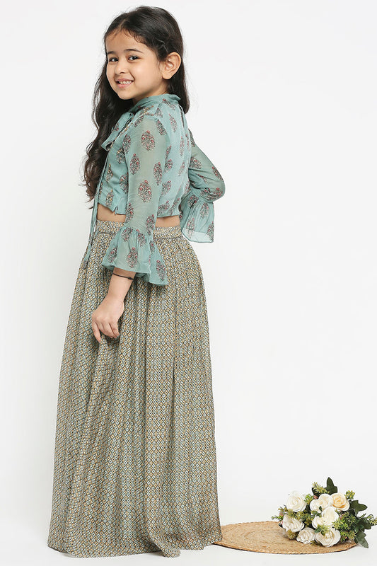 Muasir Printed Skirt Paired With Crop Top Which Has Bell Sleeves And Neck Tie Up