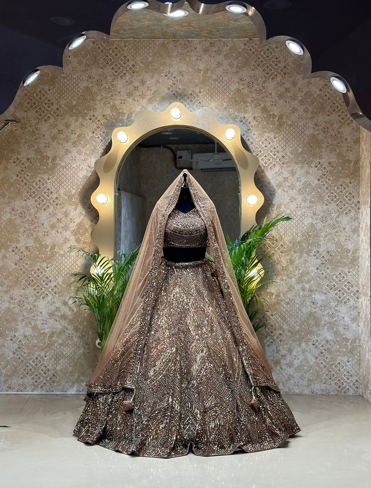 Tan Net Hand Embroidered Pearl Work Bridal Lehenga