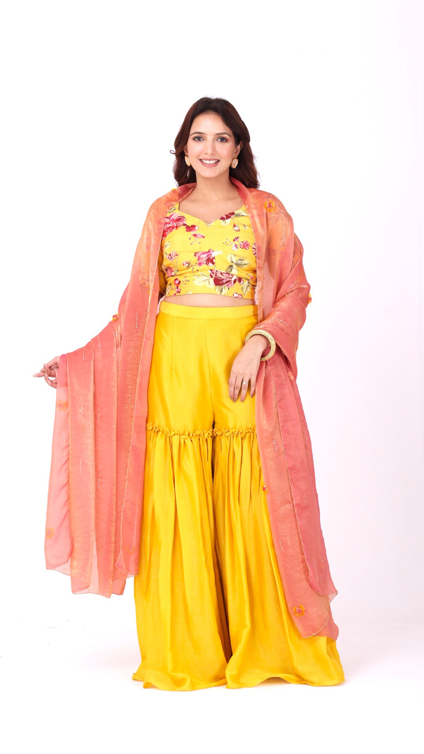 Yellow floral choli with sharara pants and organza dupatta