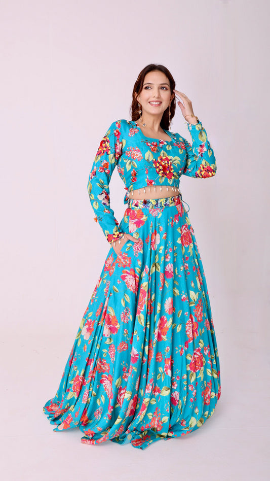 Vibrant floral embroidered turquoise blue skirt & choli set with back tie-up