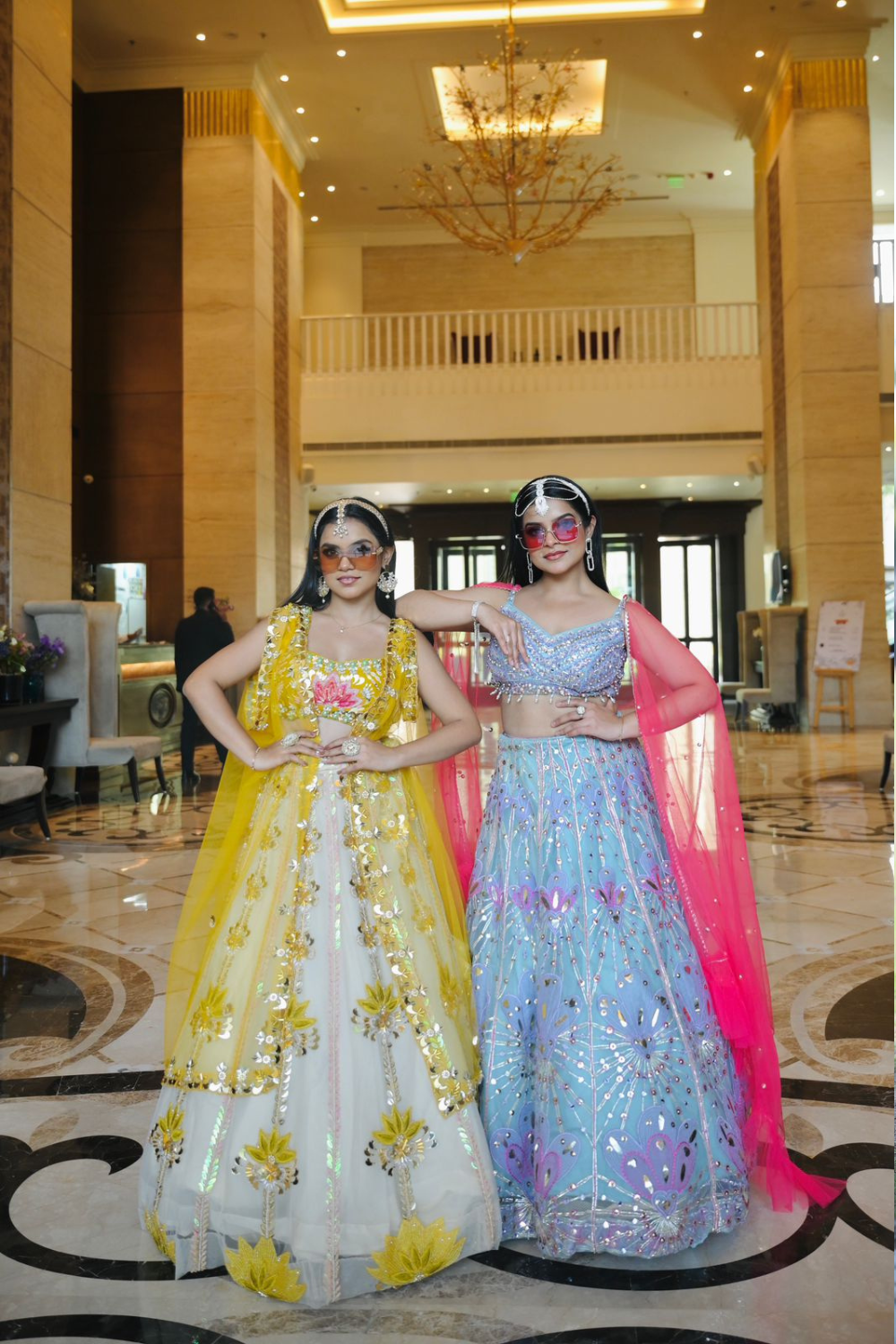 Powder blue net lehenga choli with hand cut dana and mirror work