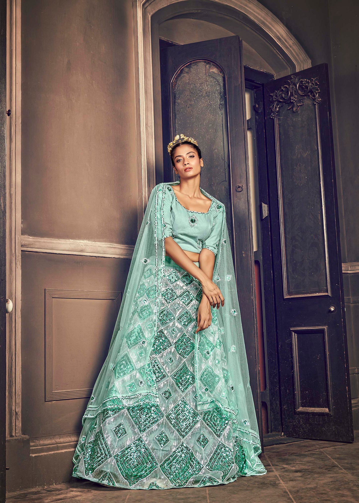 Elegant Blue Color Embroidered Net Lehenga Choli