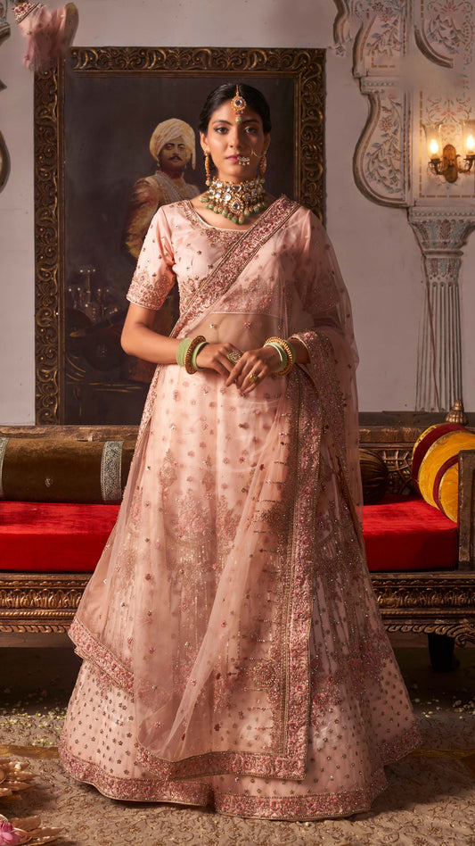 Peach Heavy Embroidered Net Lehenga Choli