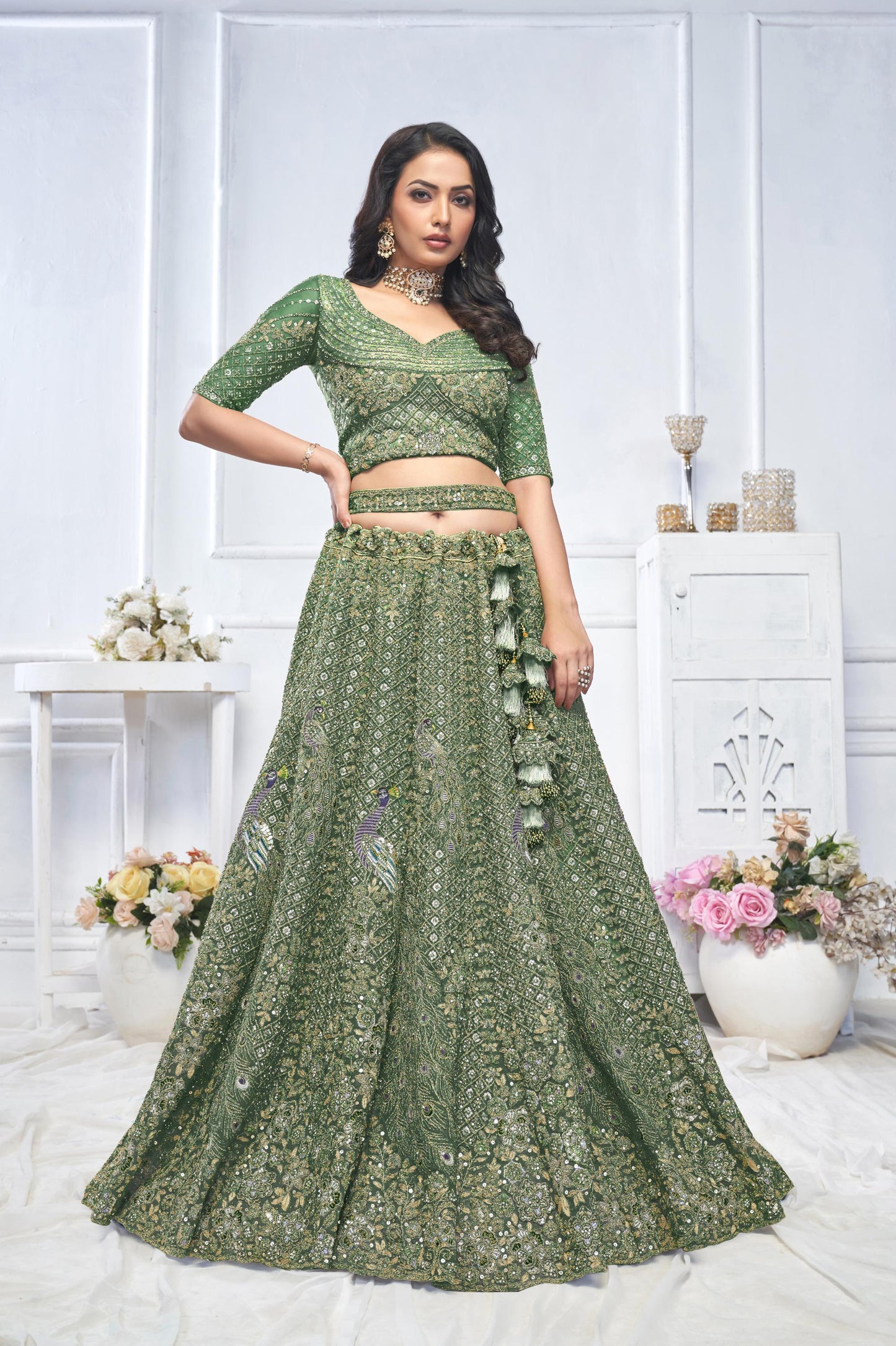 Green Heavy Sequins & Zari Embroidered Soft Net Bridal Wear Lehenga