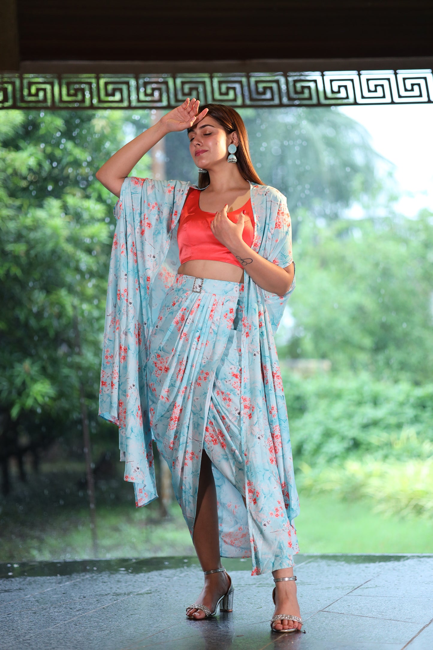 Rustwave Bustier & a pleated skirt with cape.