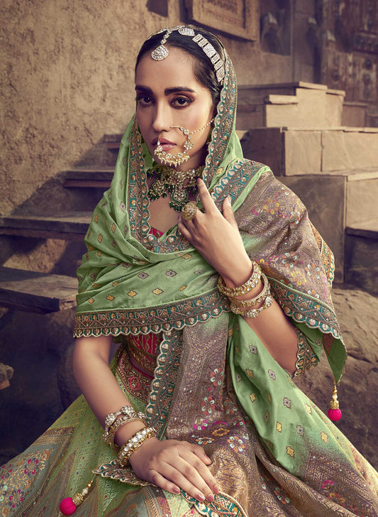 Pink and Sea Green Silk Resham Embroidered Bridal Lehenga Choli