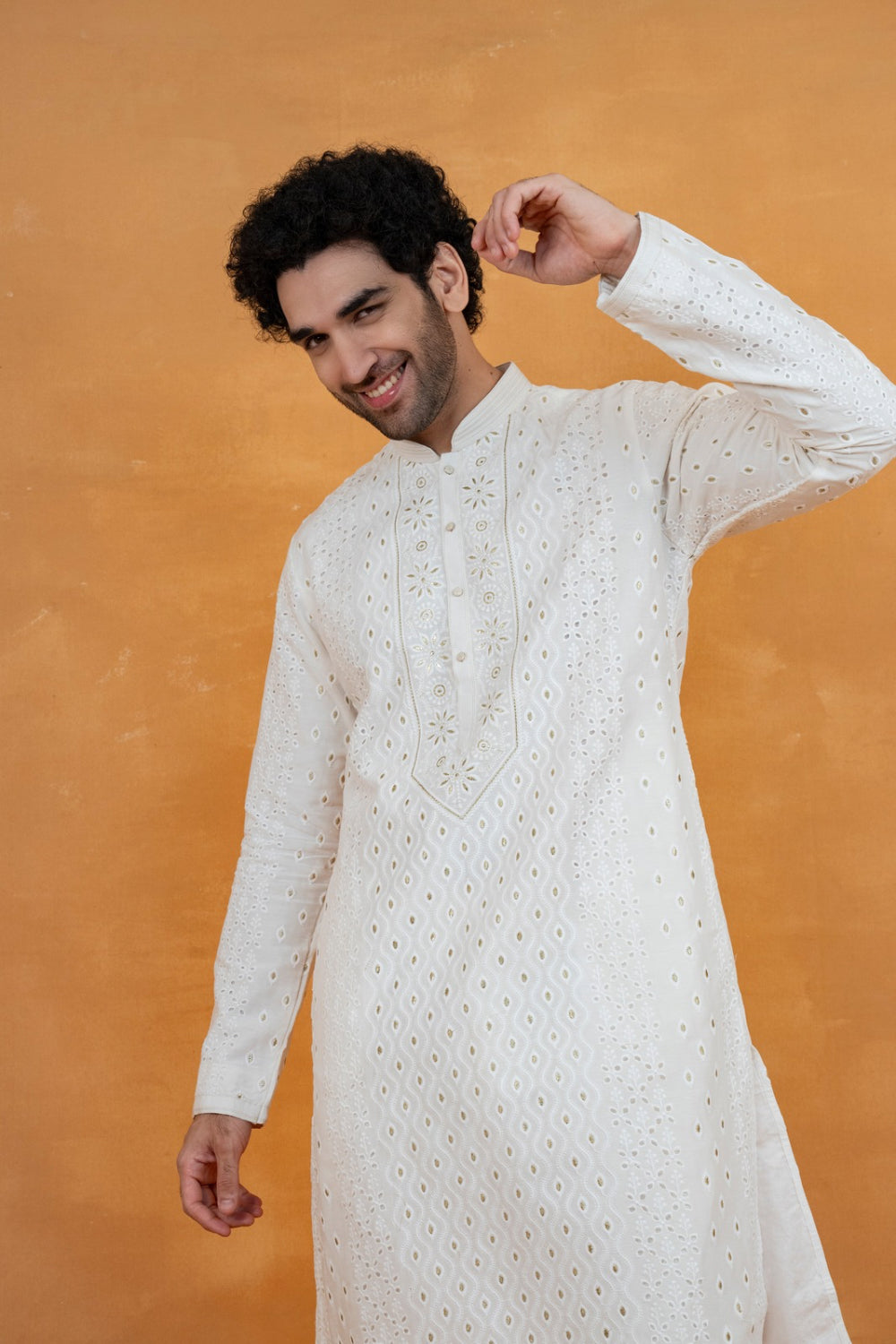 White silk kurta set with golden thread work