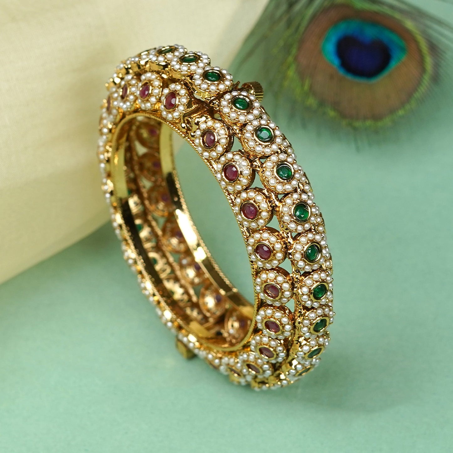 Zevar Club Gold Tone Ruby Red & Emerald Green Stone Studded Pearl Beaded Handcrafted Bracelet for Women