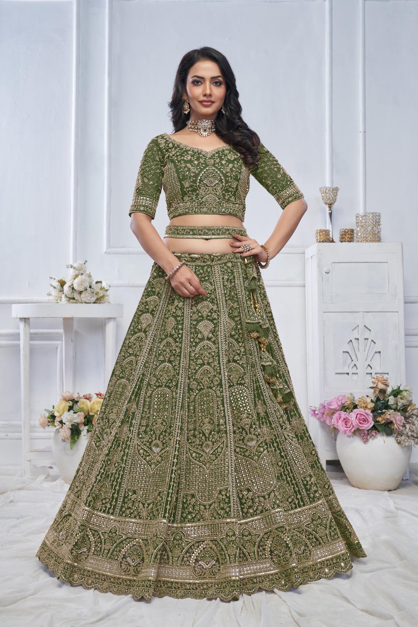Peacock Green Motif Embroidered Soft Net Bridal lehenga