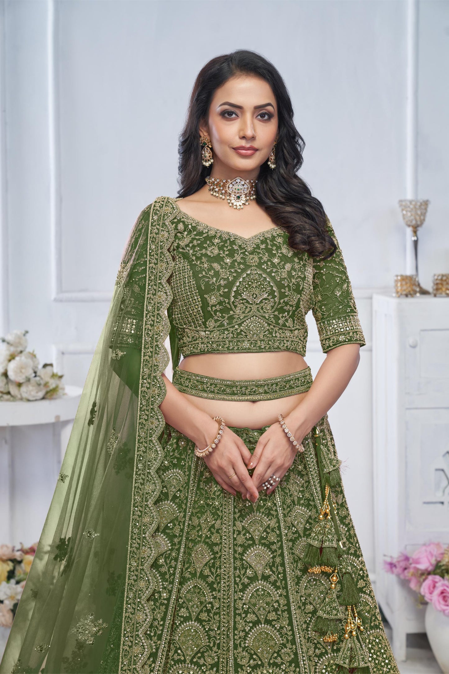 Peacock Green Motif Embroidered Soft Net Bridal lehenga