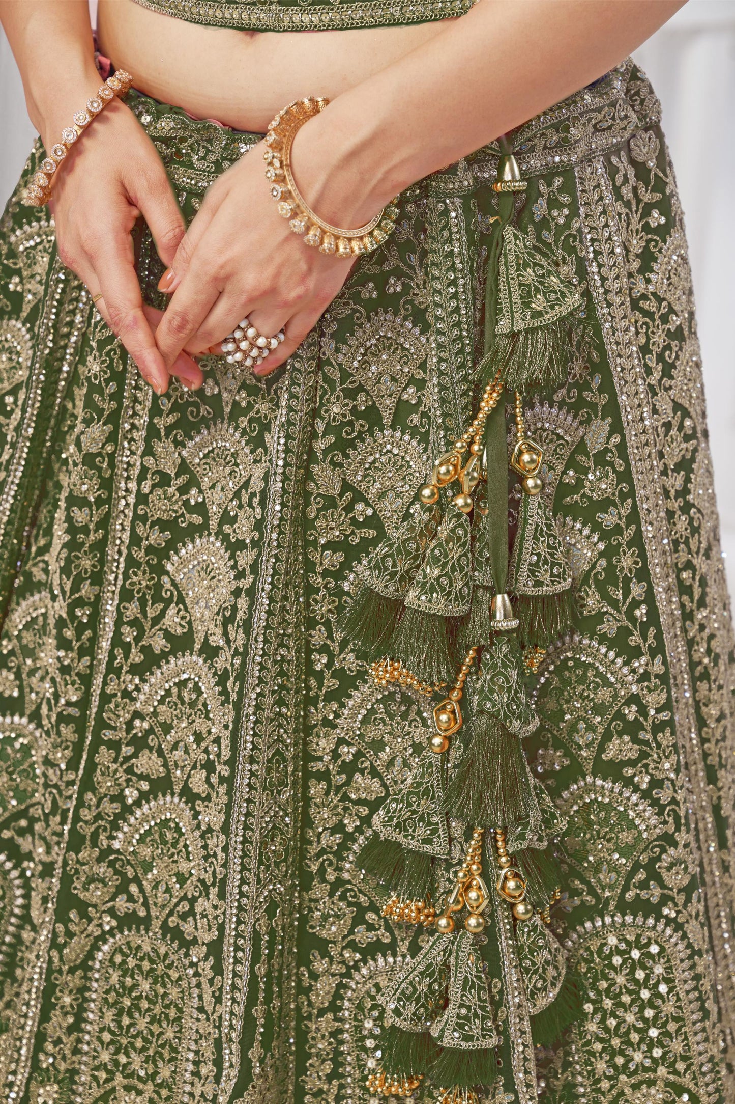 Peacock Green Motif Embroidered Soft Net Bridal lehenga