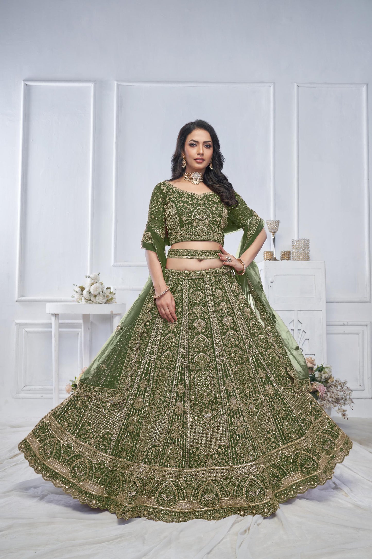 Peacock Green Motif Embroidered Soft Net Bridal lehenga