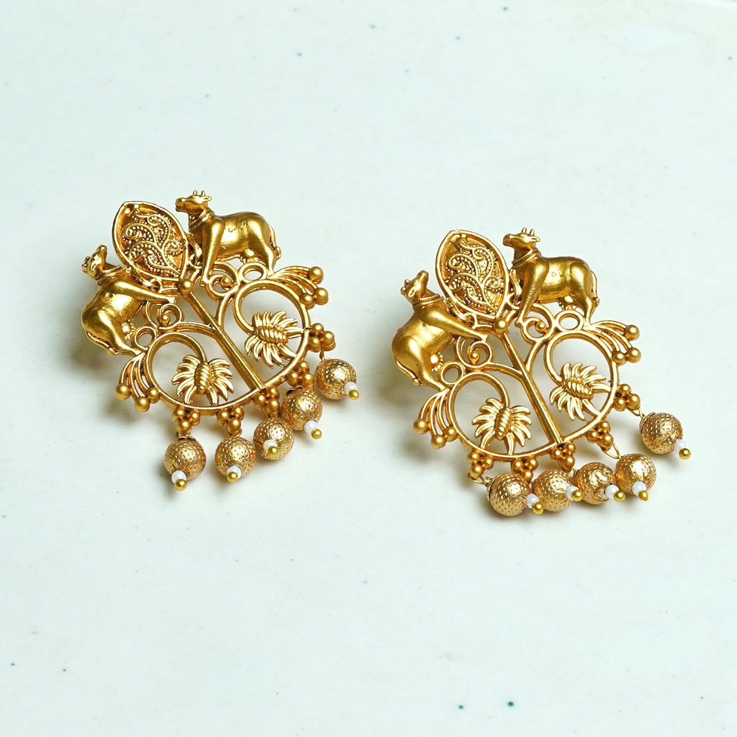 Zevar Club Oxidised Gold-Tone Cow Motif Dangler Earrings with Beads – Antique Statement Jewelry