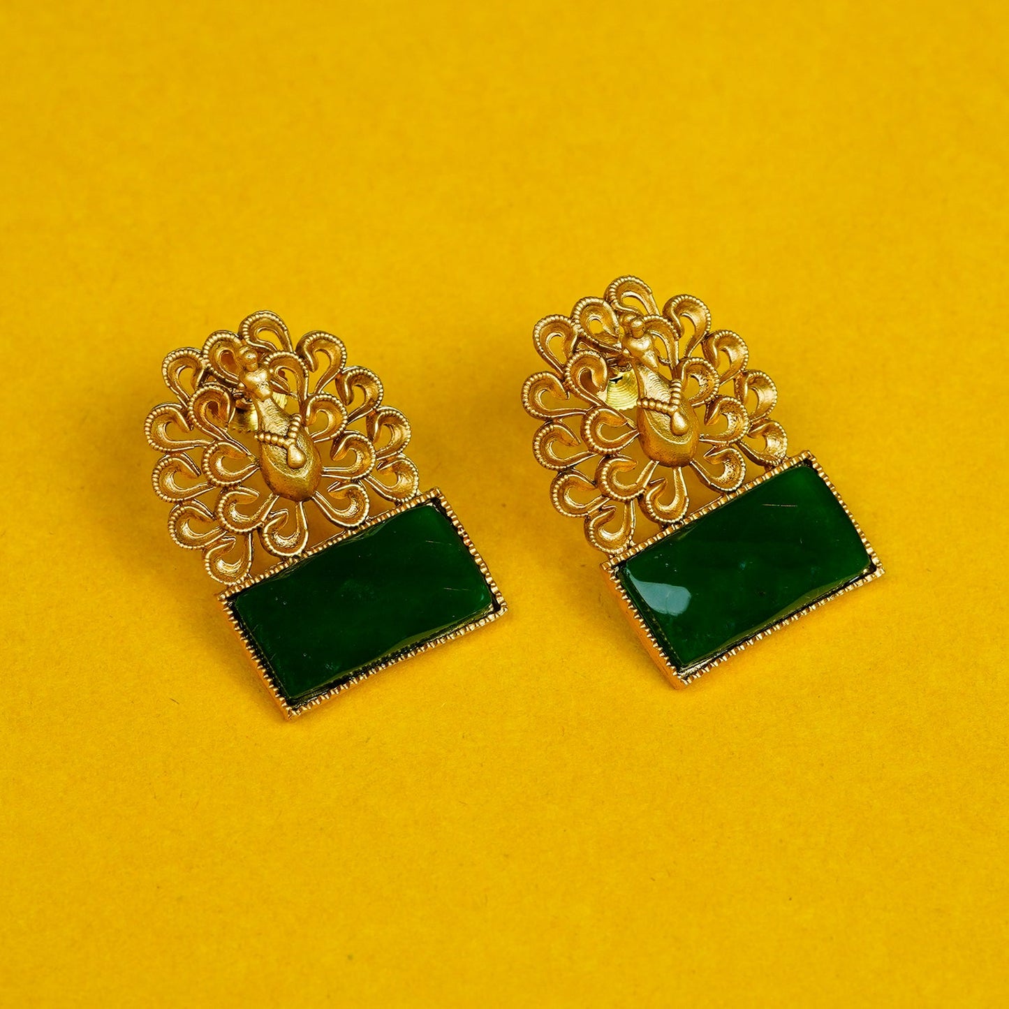 Zevar Club Brass Gold-Toned Statement Peacock Motif Earrings with Emerald Red Rectangular Stones