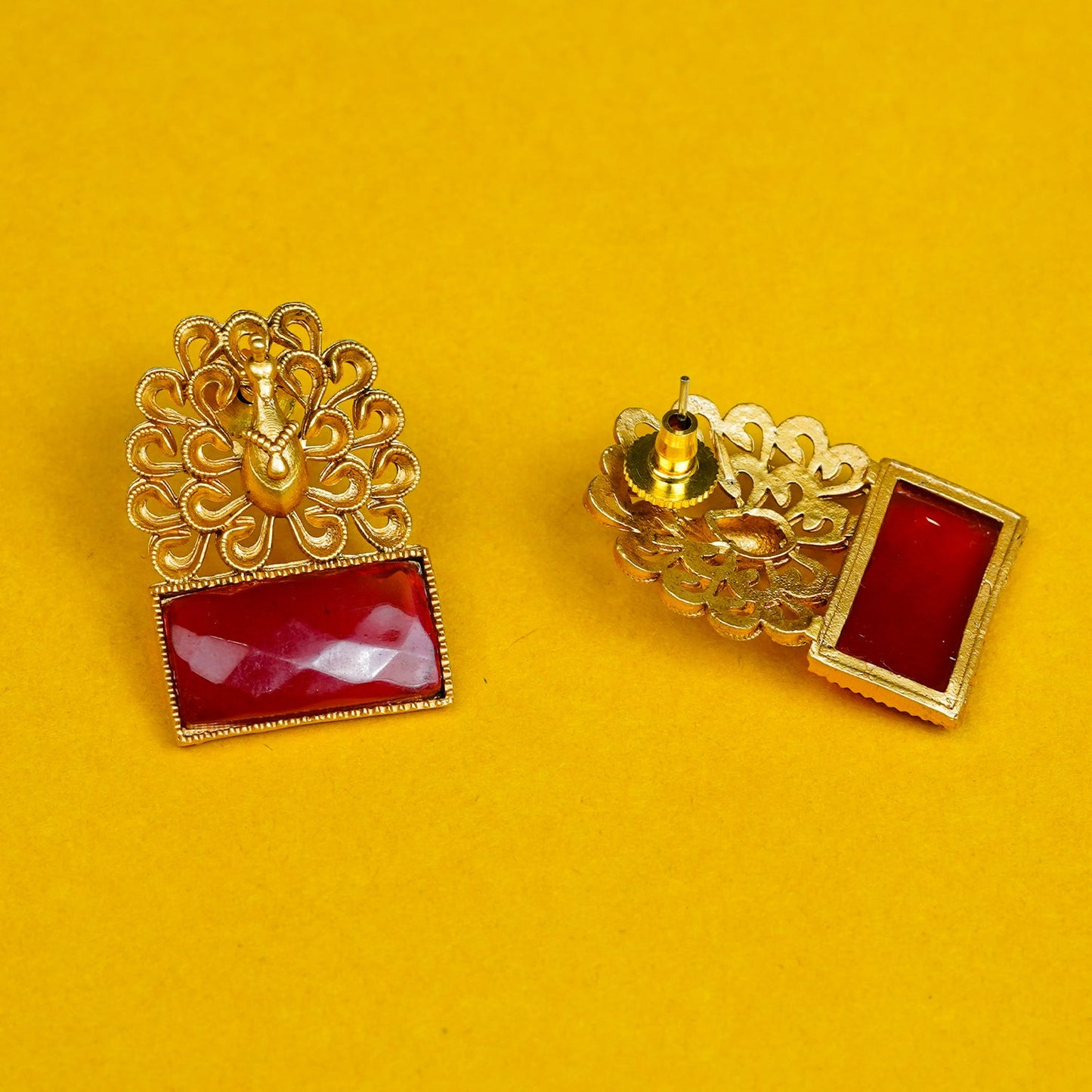 Zevar Club Brass Gold-Toned Statement Peacock Motif Earrings with Emerald Red Rectangular Stones