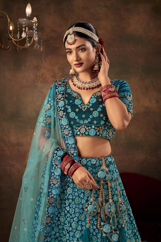 Rama Velvet Hand Embroidered Heavy Bridal Lehenga with Net Dupatta