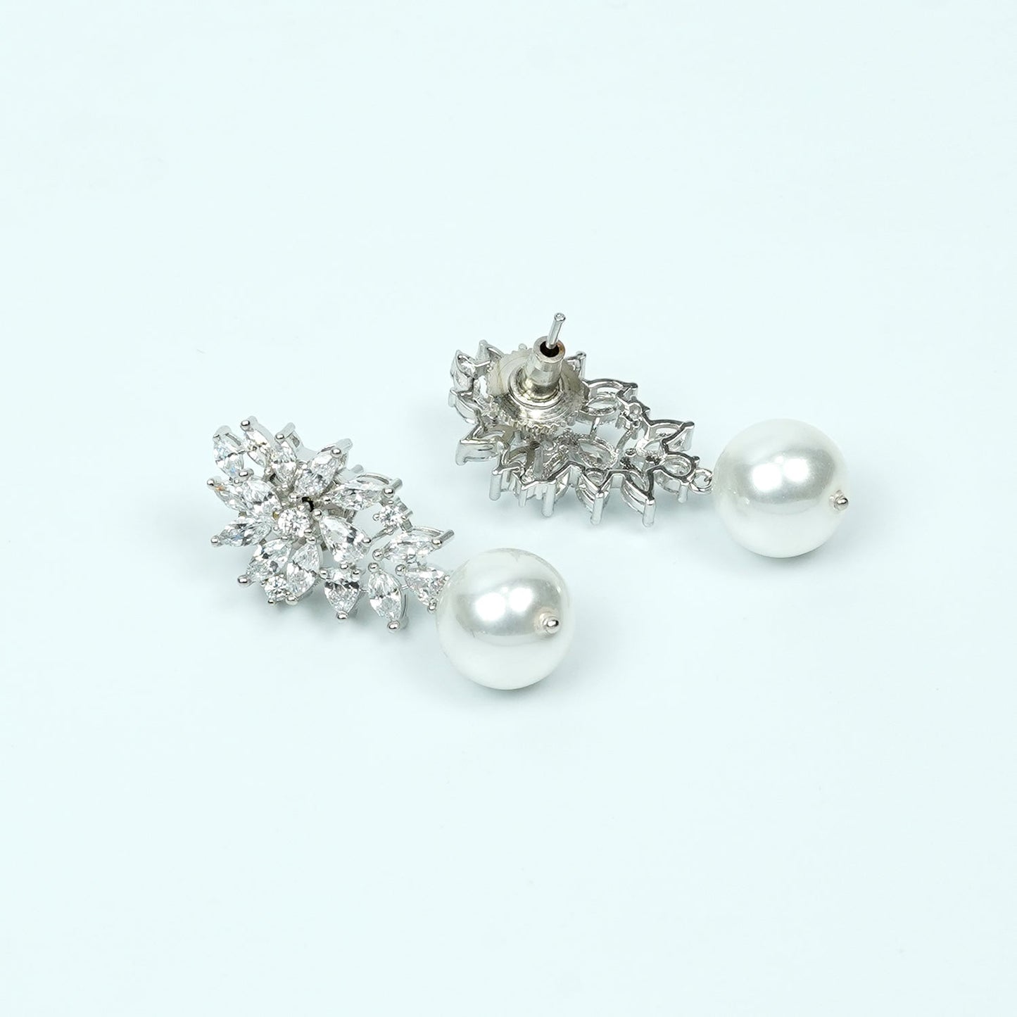Zevar Club Rhodium-Plated Handcrafted Cubic Zirconia & Pearl Studded Leaf Design Earrings
