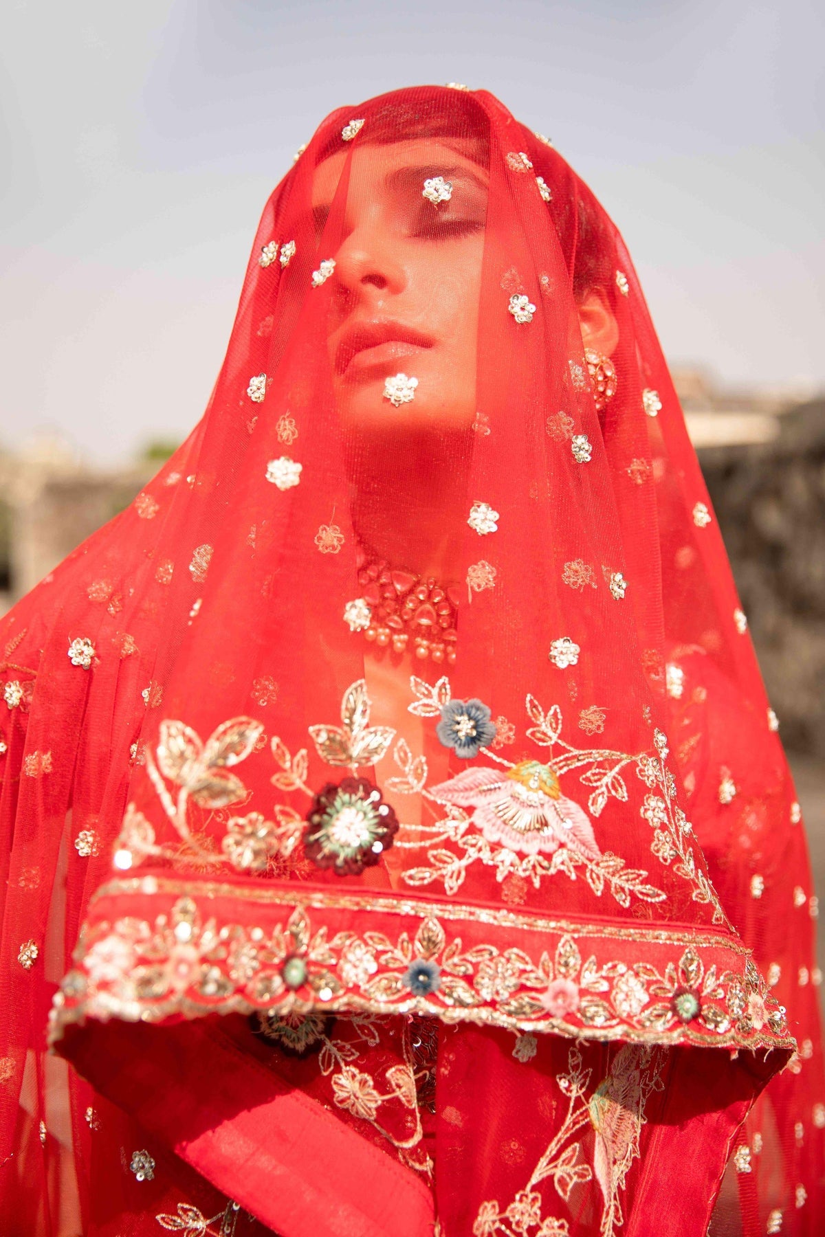Anjali, the modern Scarlet Red whimsical allure Bridal Lehenga