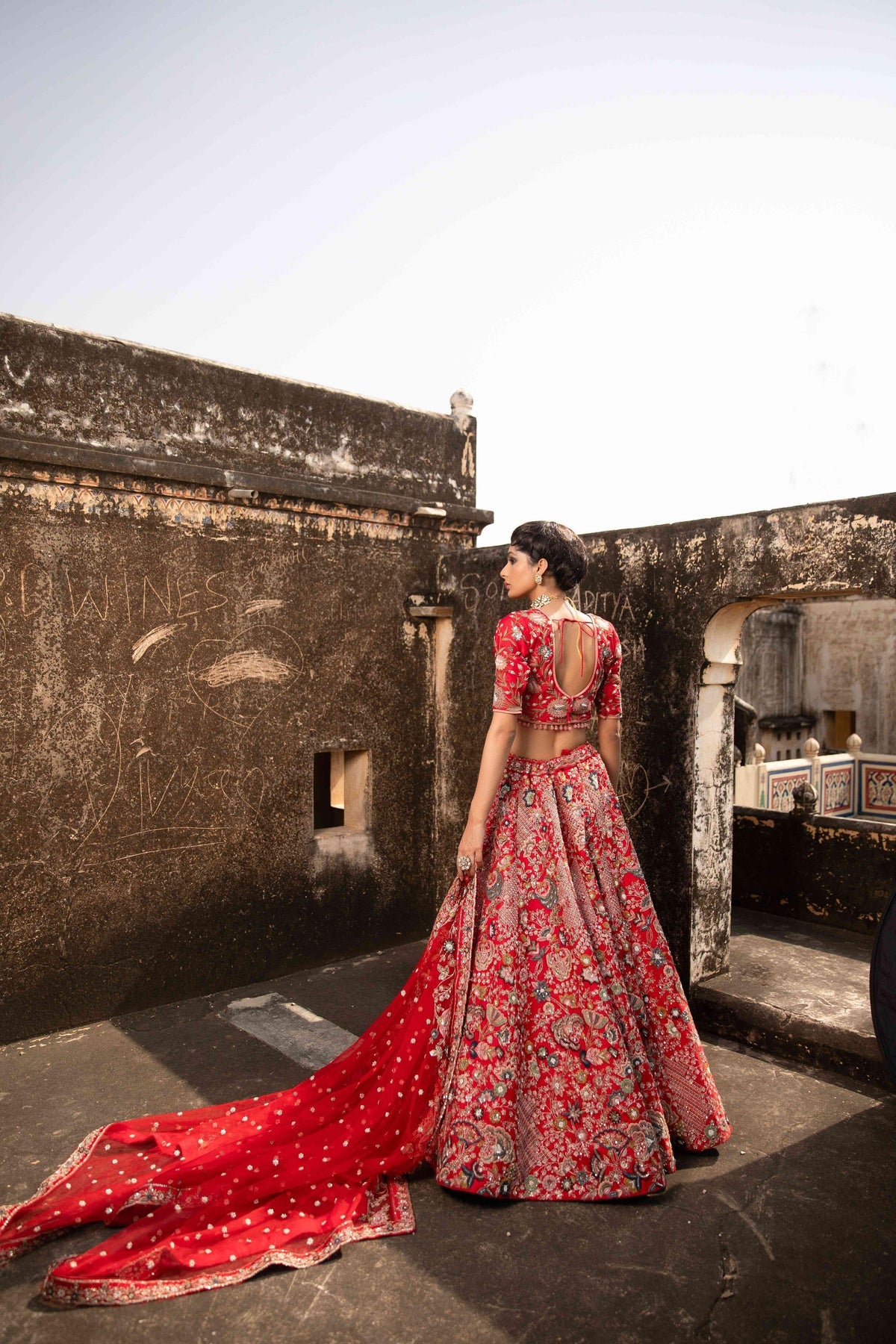 Anjali, the modern Scarlet Red whimsical allure Bridal Lehenga