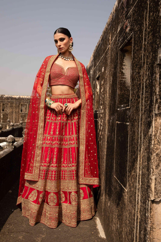 Sundaram, the eternal festive elegance Red Bridal Lehenga