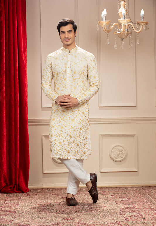Milky White and golden kurta pajama with all over resham work
