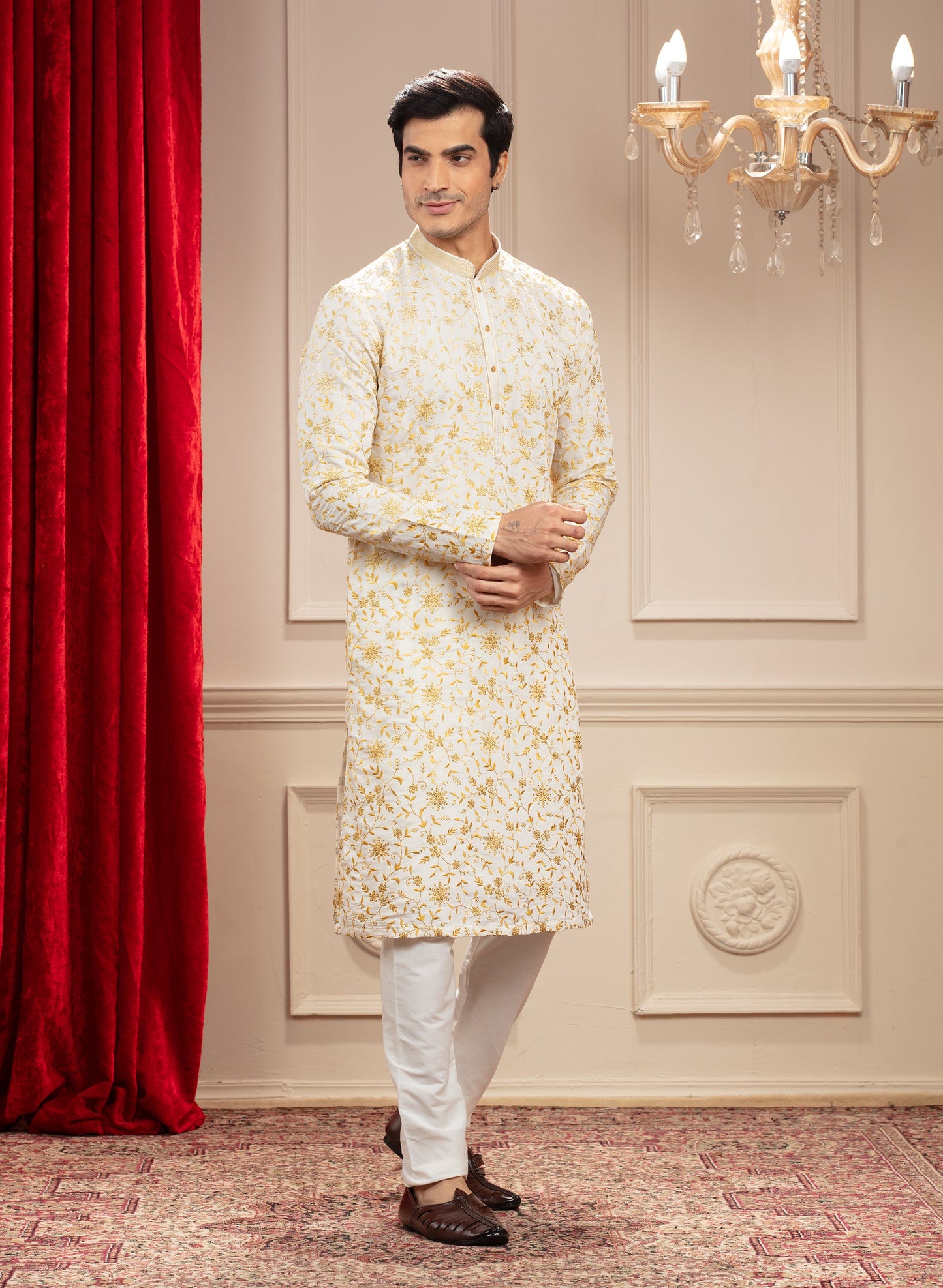 Milky White and golden kurta pajama with all over resham work