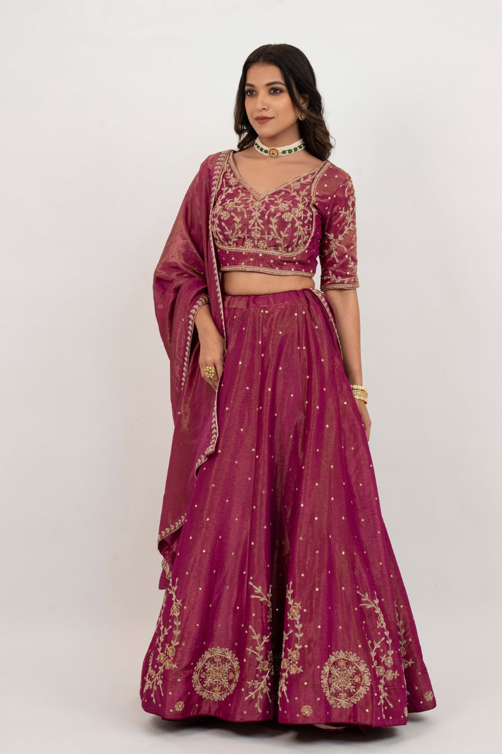 Magenta tissue silk zardozi embroidered lehenga choli with hand cut dana and beads work