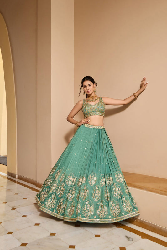 Sea green silk lehenga choli with thread embroidery and sequins work