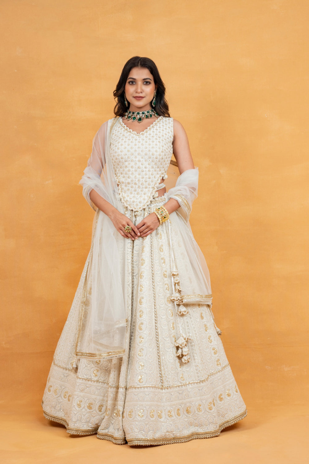 Ivory lucknowi zardozi embroidered lehenga choli with sequins work and pearls