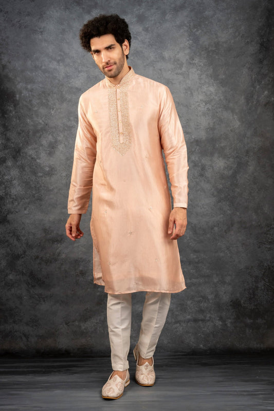Peach silk kurta set with kasab work on the yoke