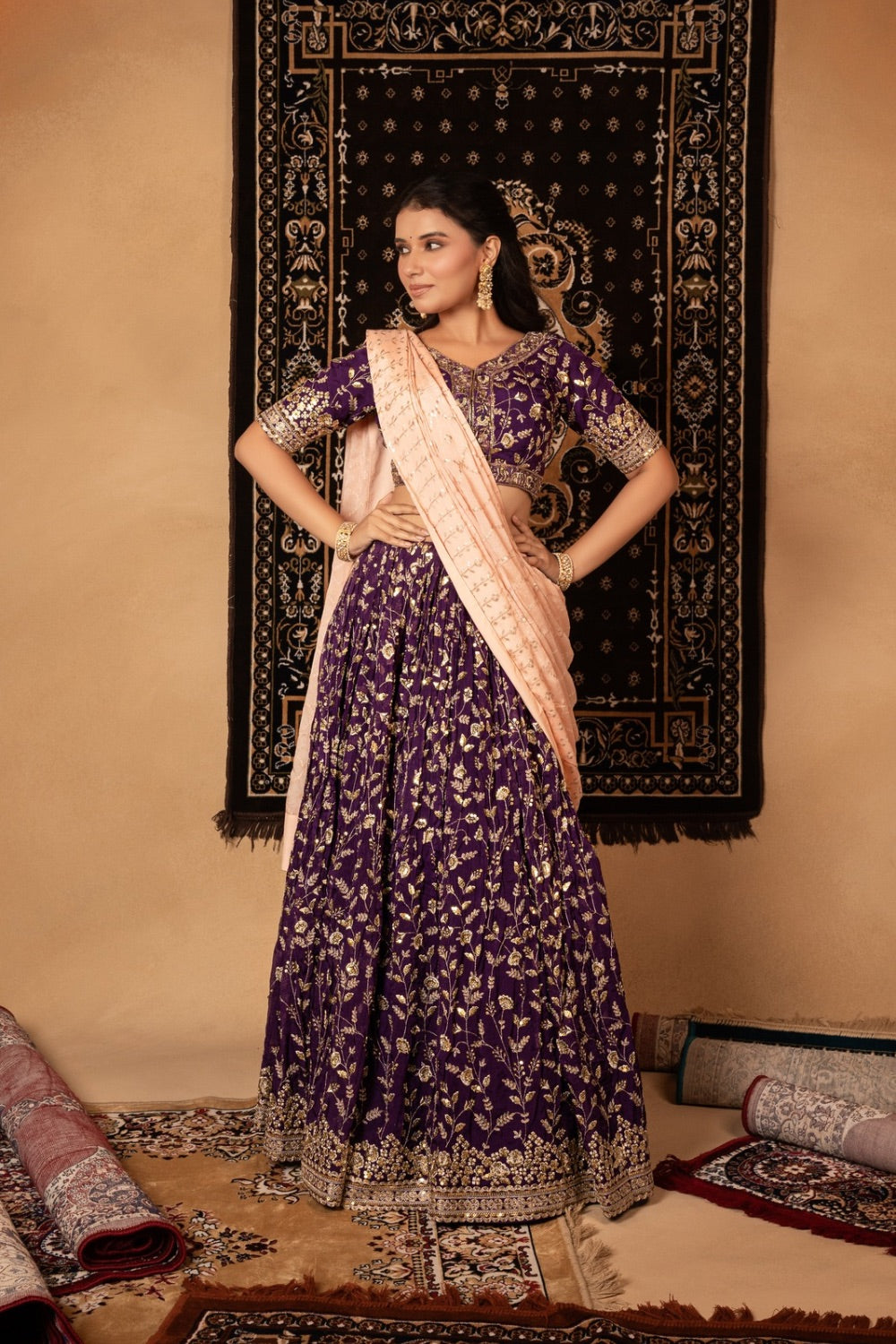 Purple organza lehenga with kasab and sequin work