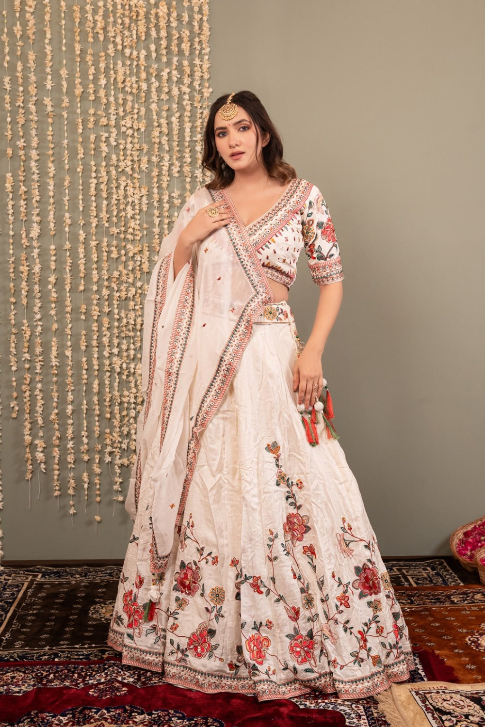 White soft silk lehenga choli with machine work