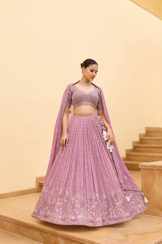 Mauve pink silk lehenga choli with thread embroidery and hand cut dana work