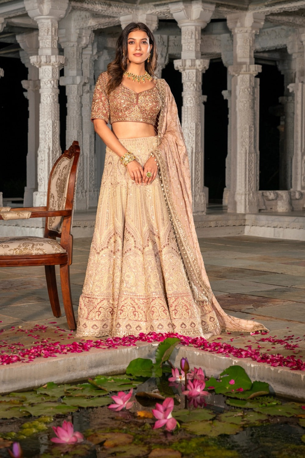 Beige lucknowi lehenga choli with hand work