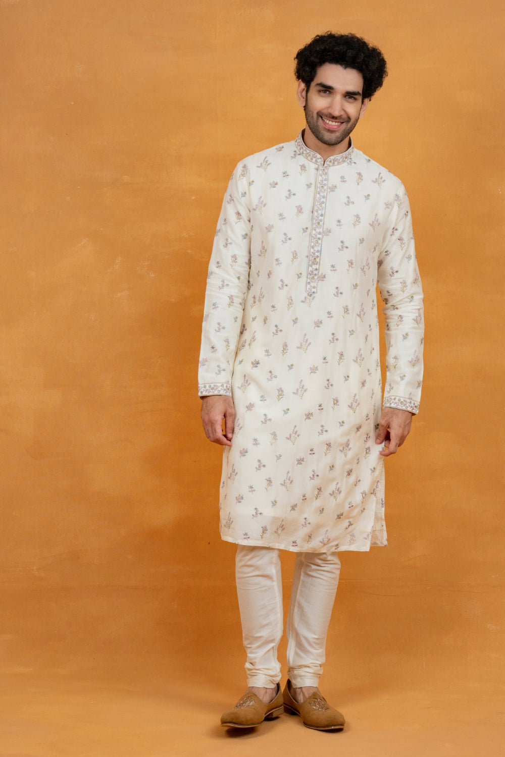Off-White silk kurta set with resham embroidery and stone work
