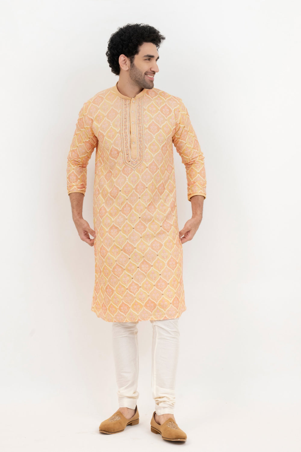 Light orange lucknowi position print kurta set with morror and thread work on yoke