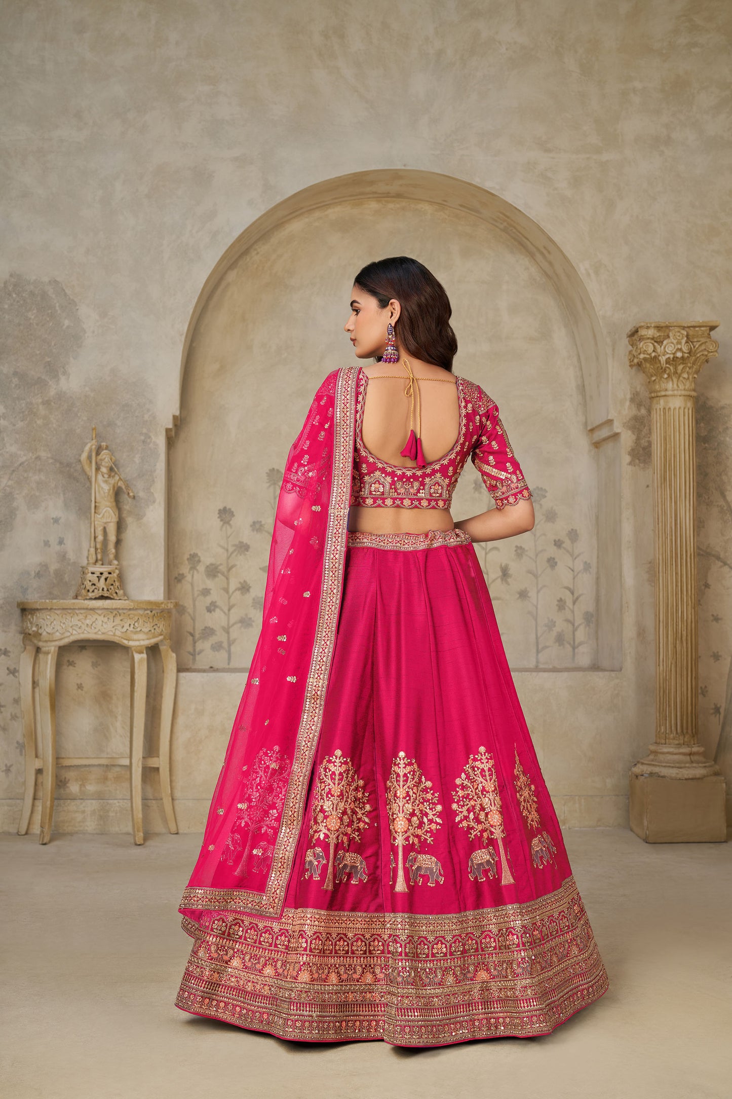 Rani Pink Silk with Elephant Motifs & Zari Embroidered Bridal Lehenga