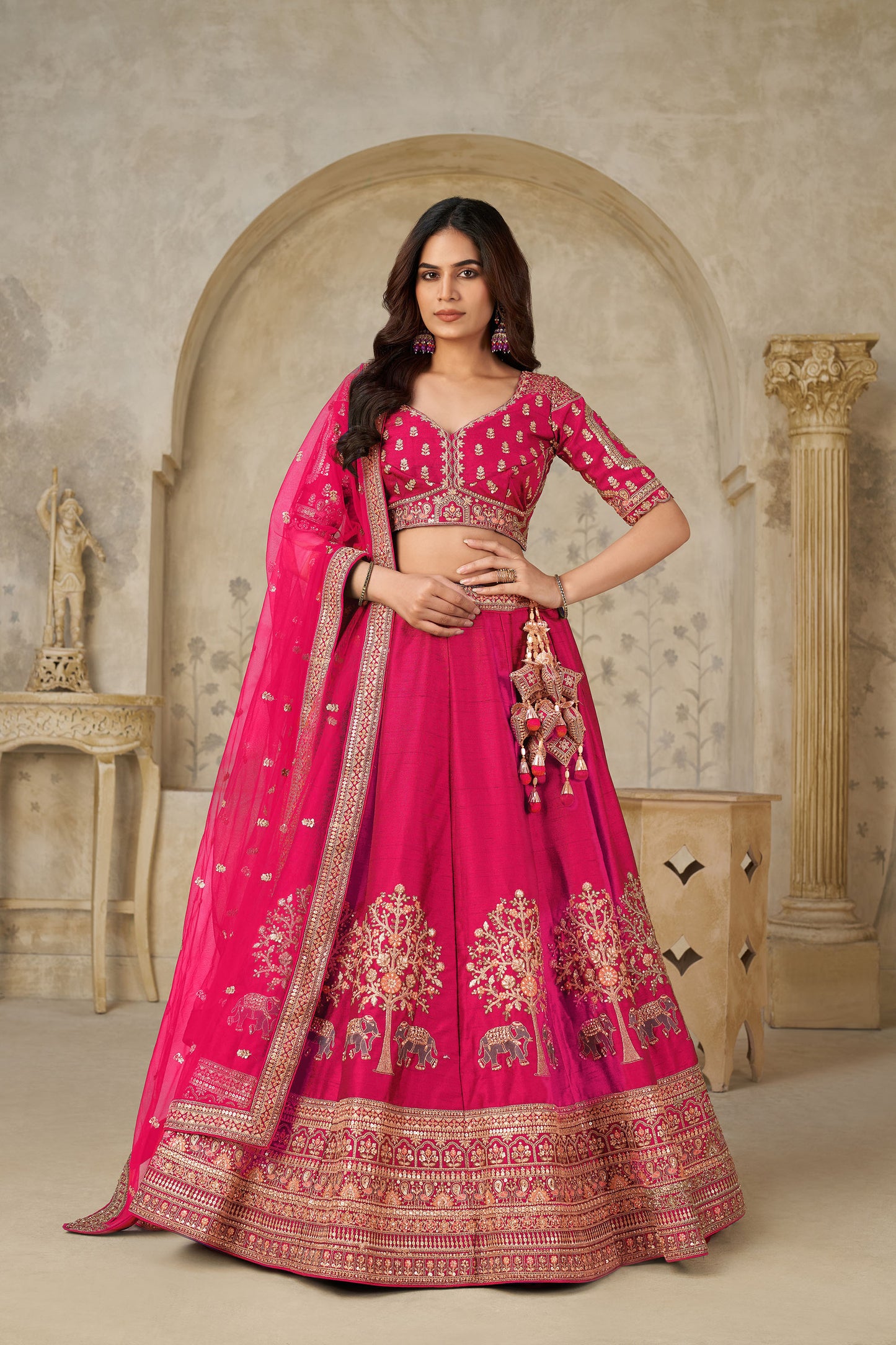 Rani Pink Silk with Elephant Motifs & Zari Embroidered Bridal Lehenga