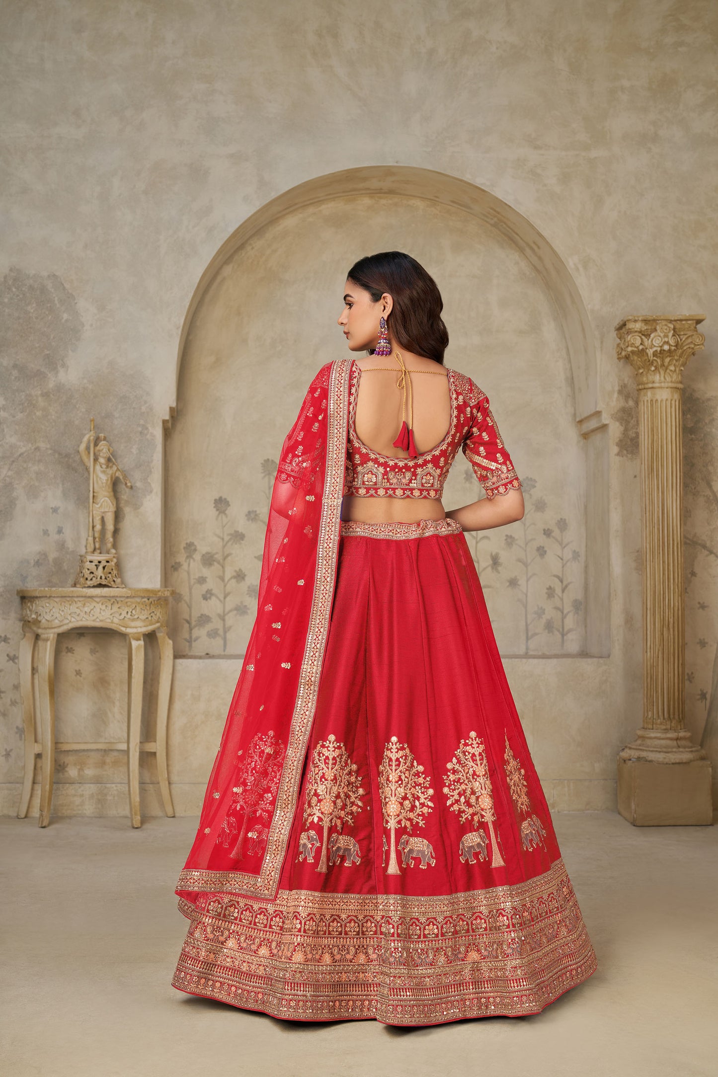 Red Silk with Elephant Motifs & Zari Embroidered Bridal Lehenga