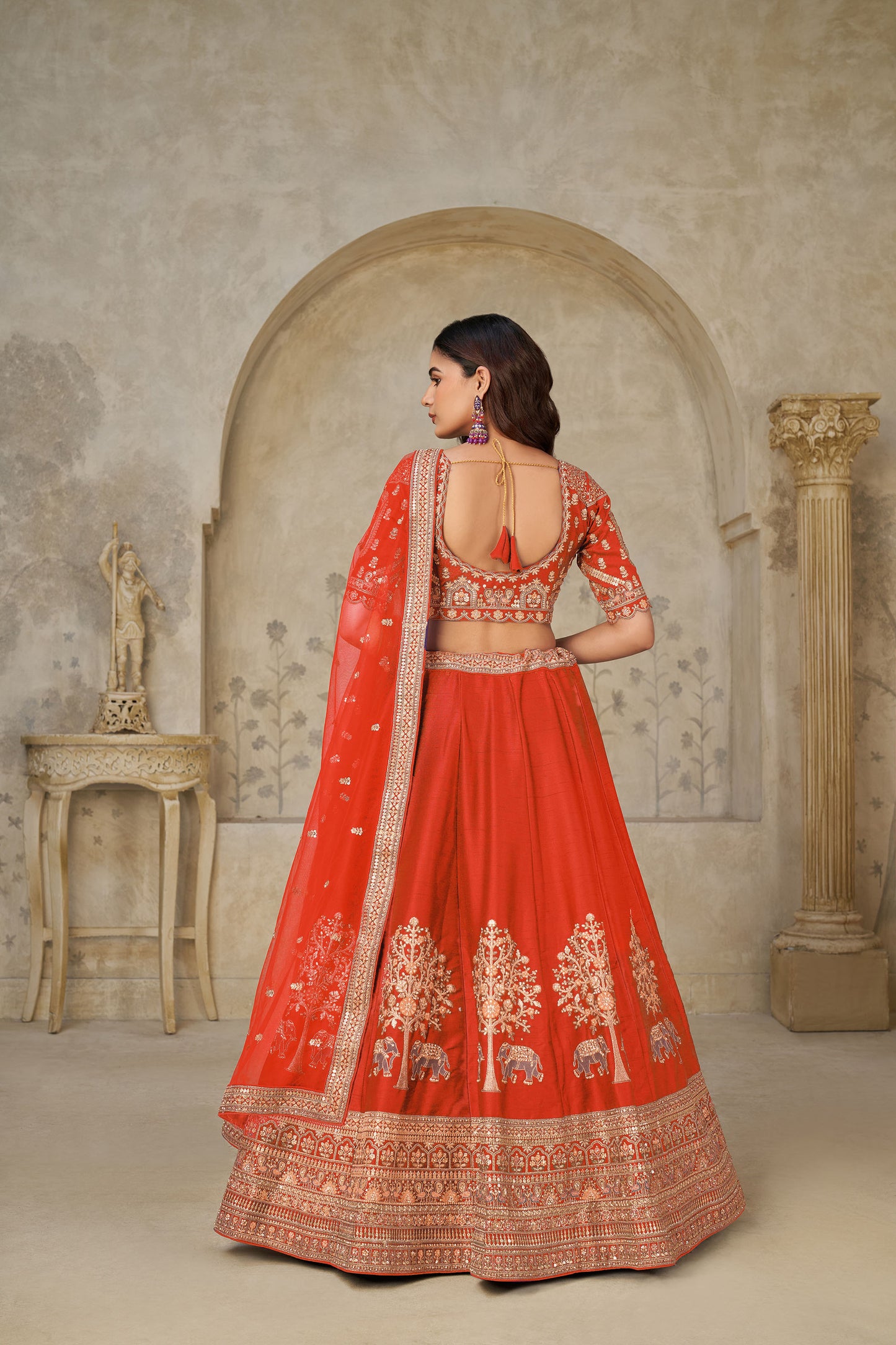 Rust Orange Silk Wedding Lehenga with Leaf Embroidery  & Peacock Motifs