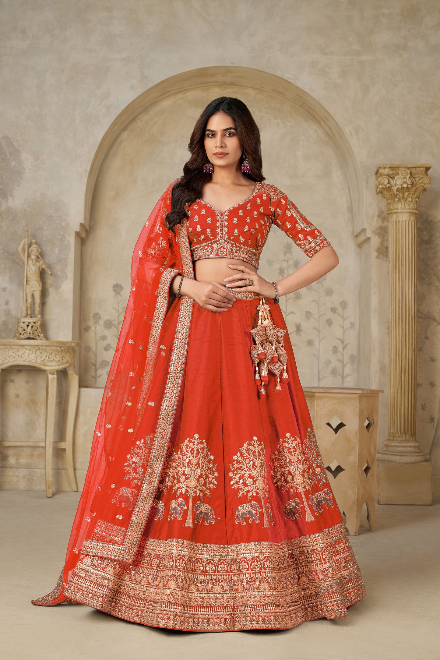 Rust Orange Silk with Elephant Motifs & Zari Embroidered Bridal Lehenga