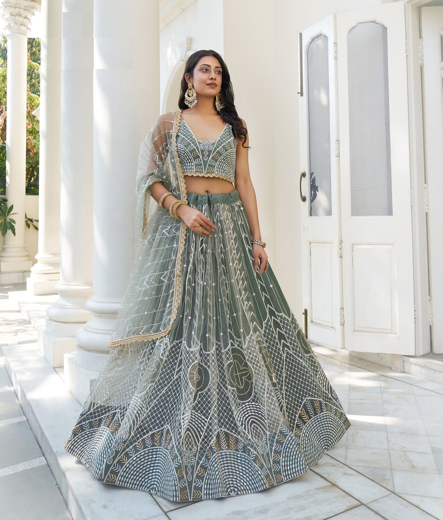 Light Green Butterfly Net Thread & Sequins Embroidered Mehendi Lehenga