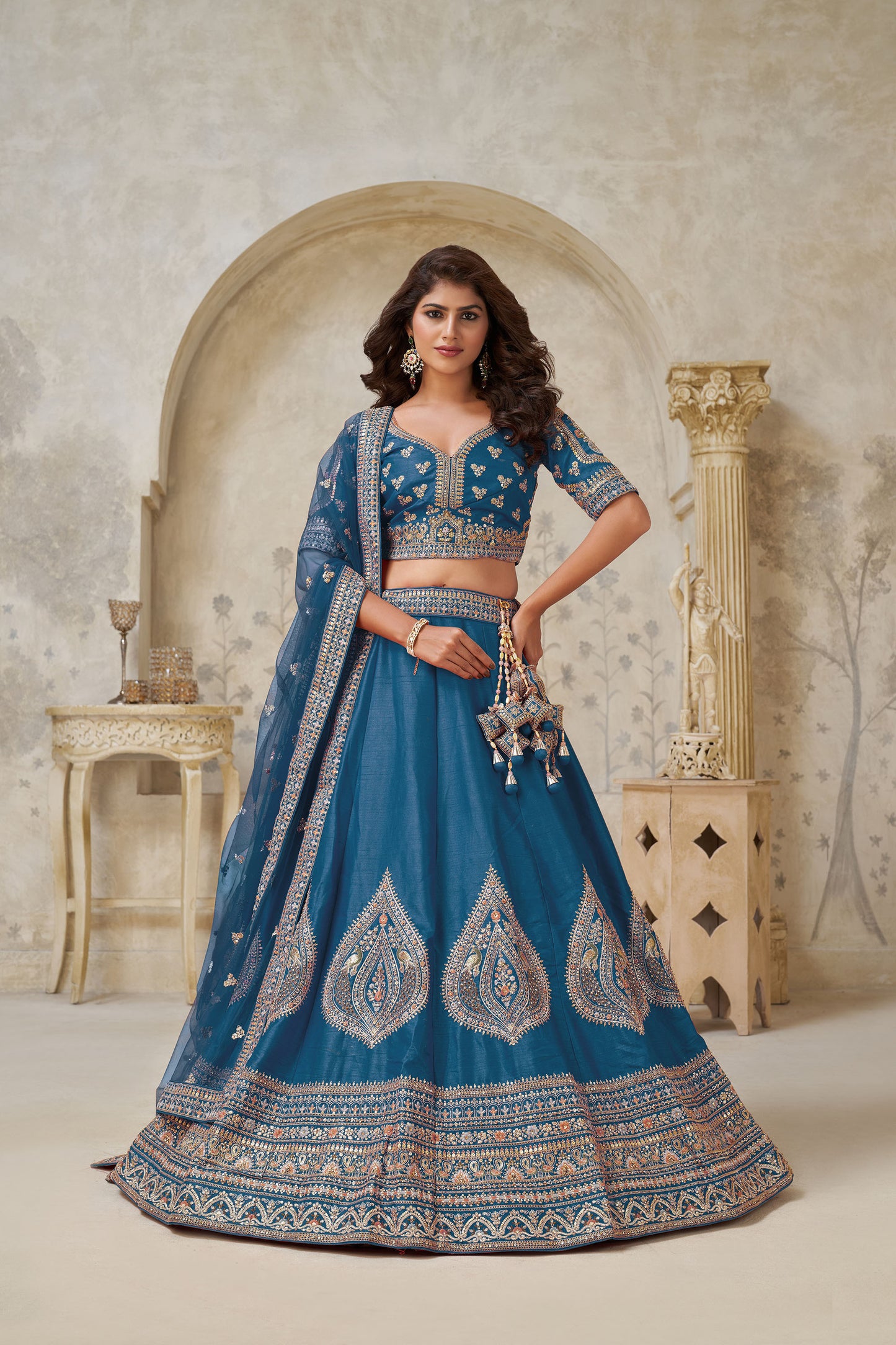 Teal Blue Silk Wedding Lehenga with Leaf & Peacock Motifs