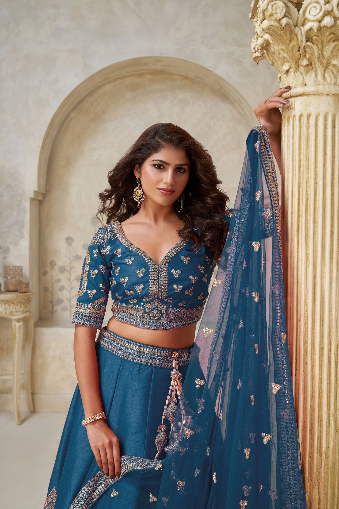 Teal Blue Silk Wedding Lehenga with Leaf & Peacock Motifs